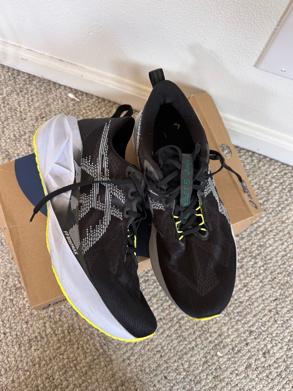 ASICS NovaBlast 5 Black Running Shoes with Neon Yellow Accents